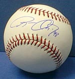 Russ Ortiz and Roy Halladay were baseball's winningest pitchers this season. Collectors should look to add them to their collection of 20-plus-game winners.