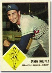 A 1963 Fleer ##42 Sandy Koufax in PSA 9 realized $2,910.