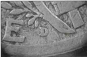 This alteration may appear easy to spot with this blown-up photo,<br>but it was deceiving enough to fool the collector who sent it in.
