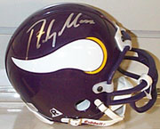 Randy Moss autographed mini helmet, at auction on Sports Collectors Universe until 8/22/99.