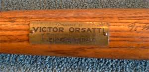The bat was originally awarded to a talented teenage athlete named Victor Orsatti, and affixed with this name plate.