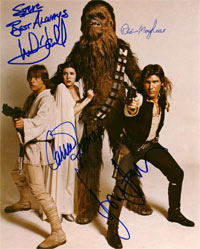 This image of autographs by Mark Hamill, Carrie Fisher, Peter Mayhew and Harrison Ford of the 1977 film, Star Wars, is part of the new, extensive and free information resource about autographs of entertainment, historical and sports figures, www.PSAAutographFacts.com.