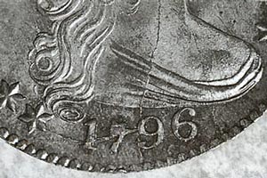 Massive die cracks on a very high-grade, well-struck <br> 1796 Draped Bust dime. Strike is not always adversely affected <br> by die cracks, as this coin plainly exhibits.