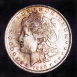 The peripheral weakness and soft luster of this obverse are characteristic of a 96-P. The genuine '96-S dollars are sometimes softly struck, too, but they have more fire than this coin.