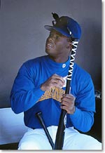 Here, Ken Griffey Jr. applies his trademark tape – what a great photo!