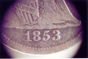 Where did the arrows go? This coin alteration would be laughable if it weren't so potentially dangerous to somone's pocketbook.